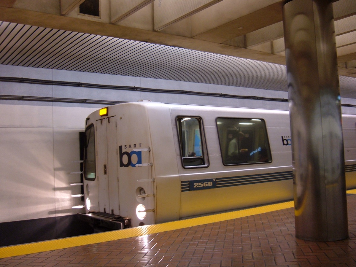 A BART train at a station platform
